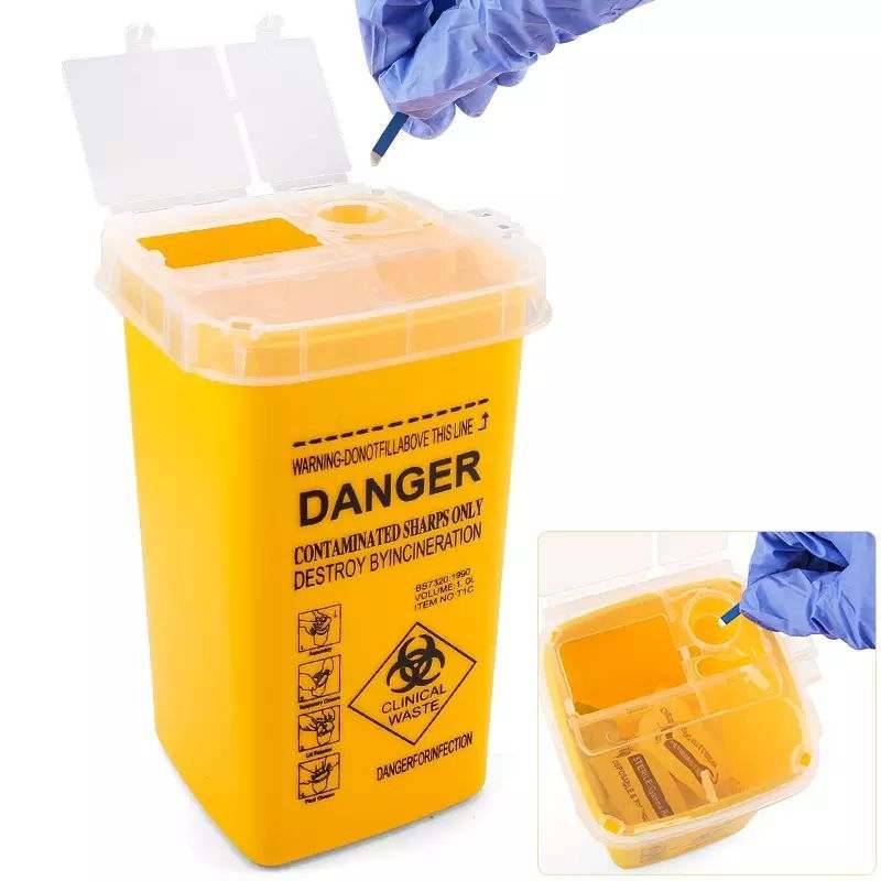 Small yellow sharps container for safe needle disposal.